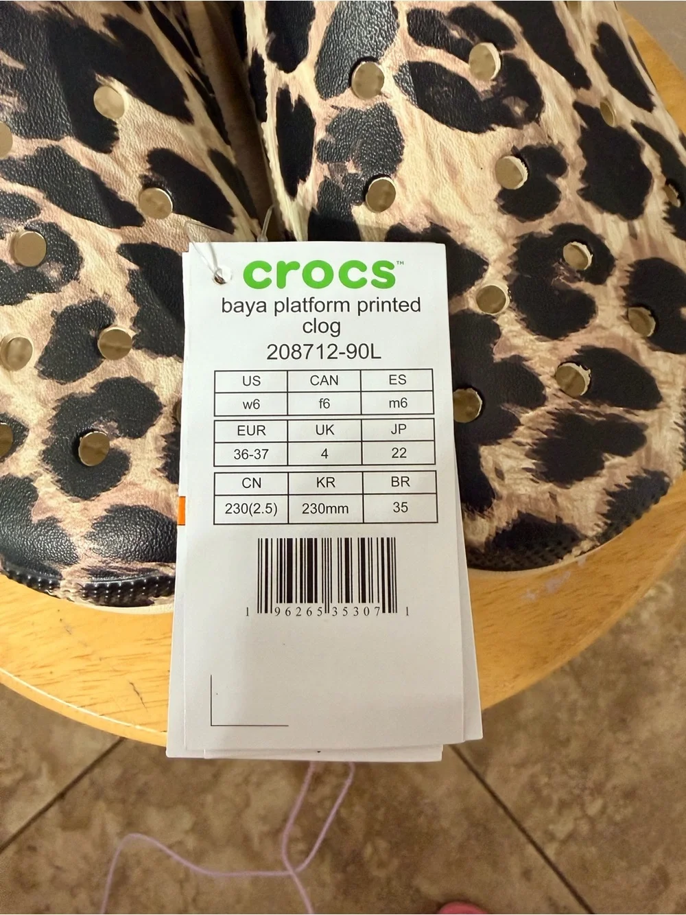 CROCS Women Size US 6 Leopard Print Clogs in Black and Cream size W6